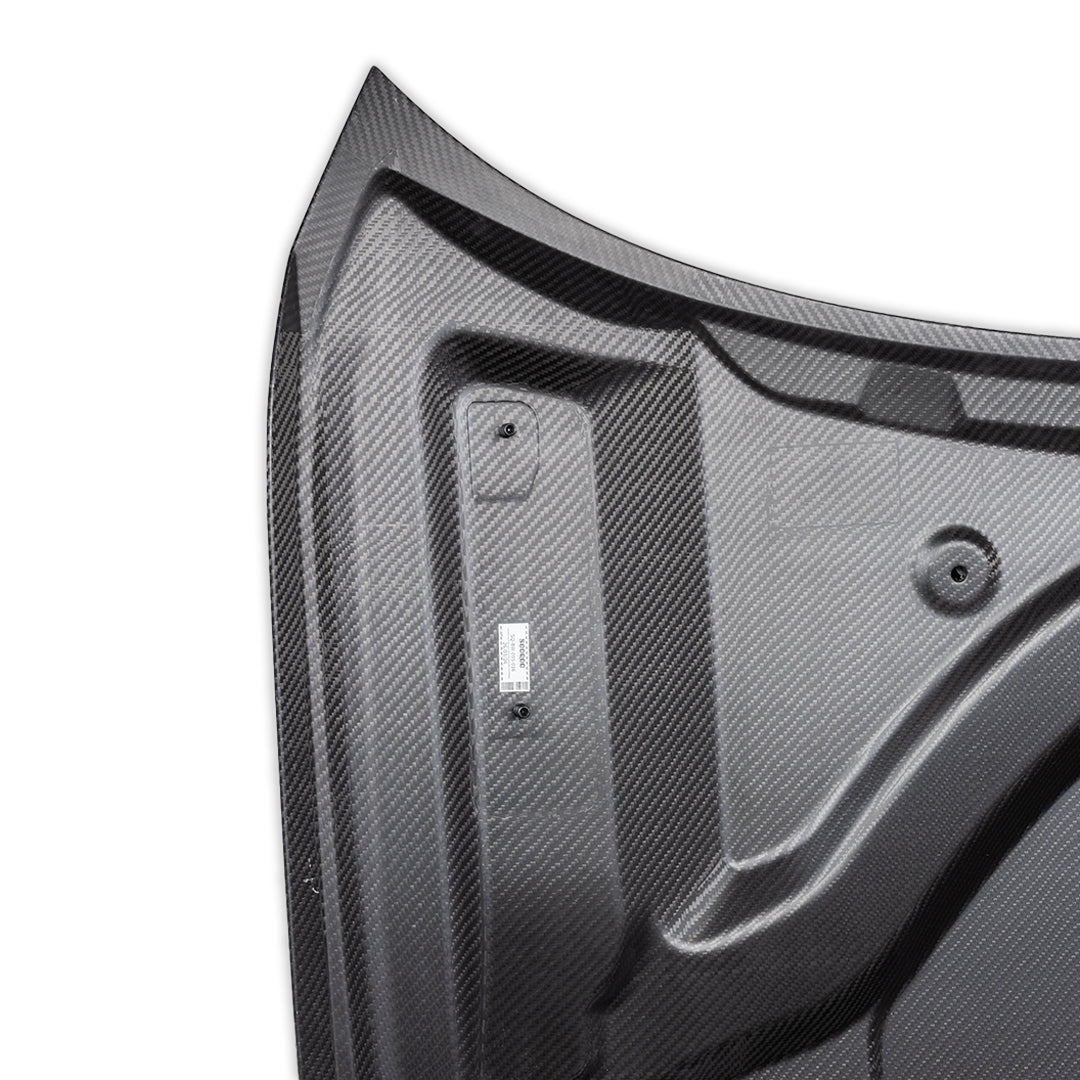BMW M4 G82 carbon motorkap close-up